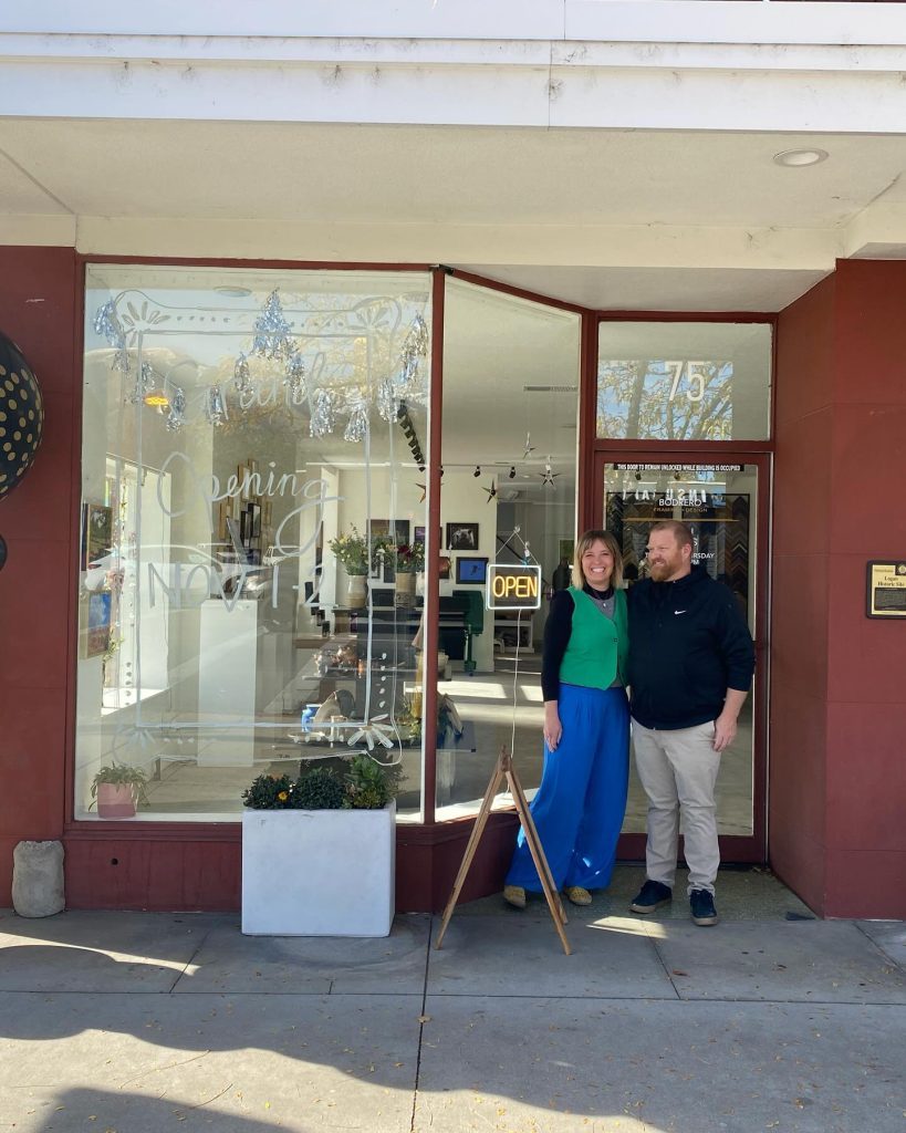 The owners of Bodrero Framing & Design outside their Logan, Utah storefront